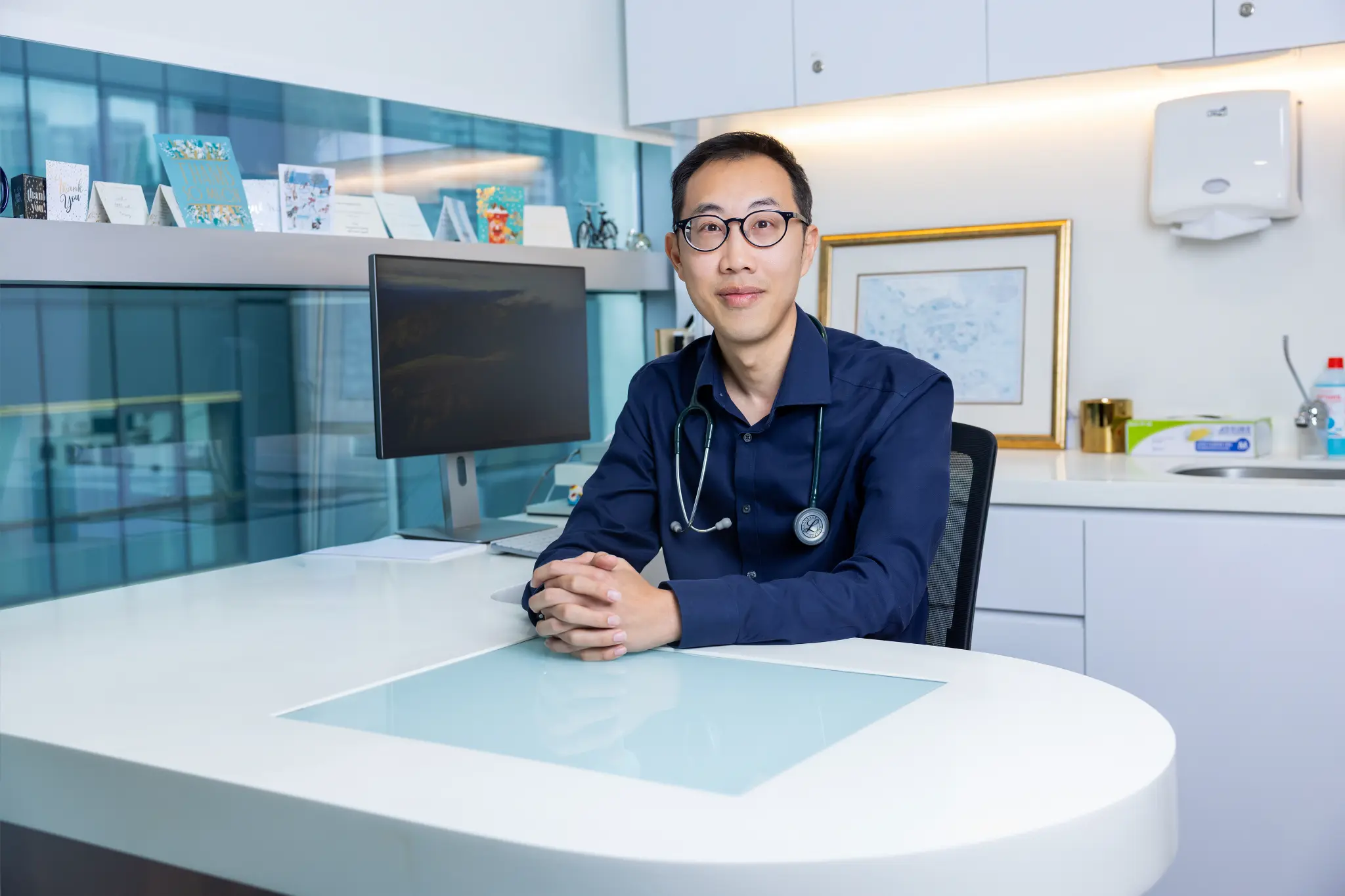 Dr Desmond Ooi in his consultation room at Mount Alvernia Hospital